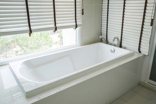 White bathtub with windows